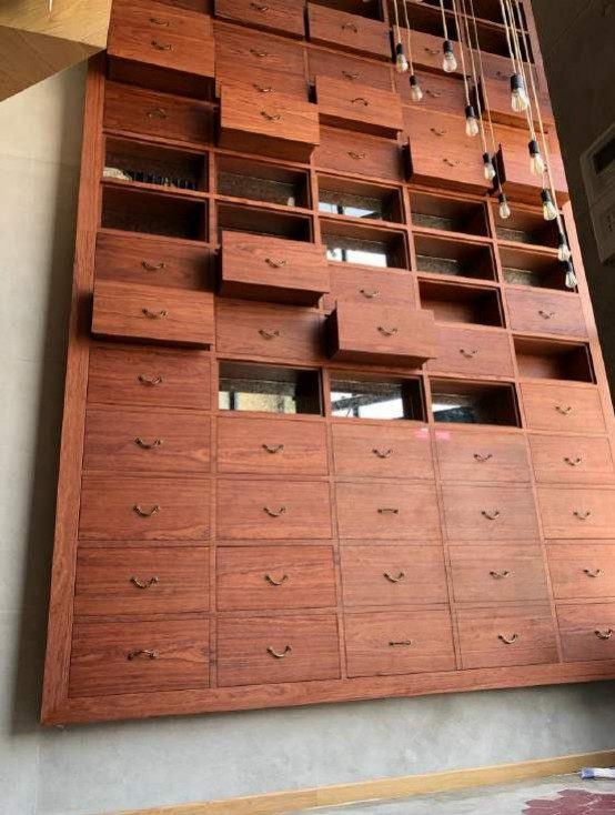 RX Café apothecary drawer wall millwork